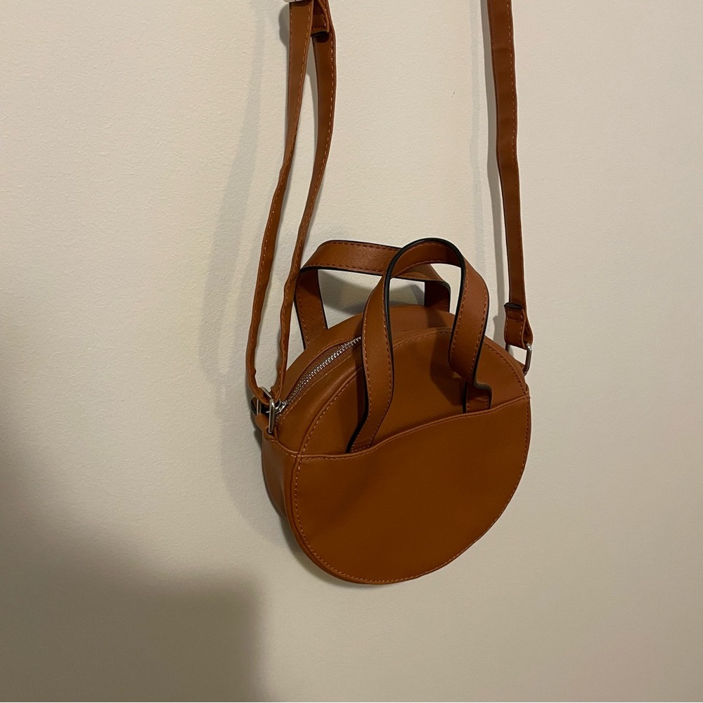 GONE IN 24 HRS - Circular purse